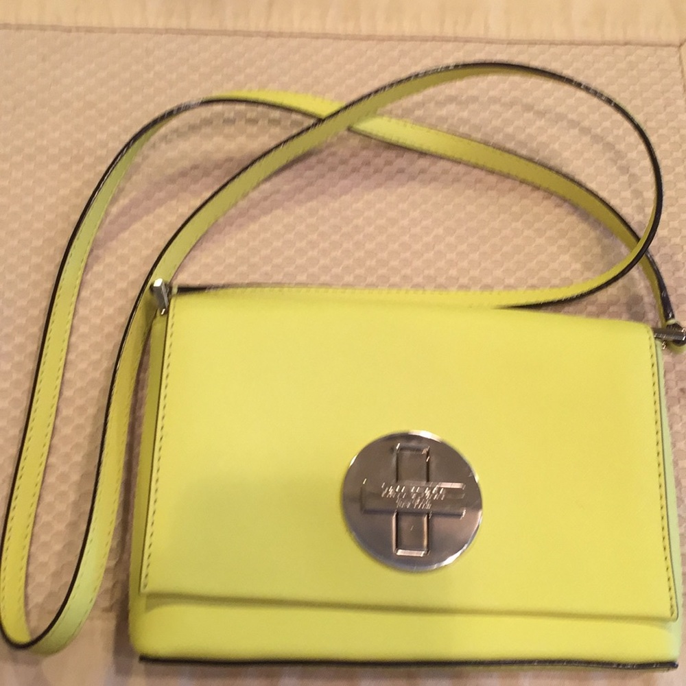 Neon yellow Kate Spade crossbody purse